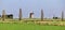 Windmill in a n English rural landscape with fields of crops