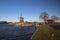 Windmill and old sluice at river Rotte in Zevenhuizen