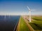 Windmill park in the Netherlands ocean, Windmill farm with huge turbines green energy in the Netherlands Europe
