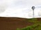 Windmill in plowed field in Palouse