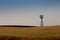 Windmill on a prairie farm