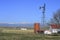 Windmill and Red and White Barn and Longs Peak