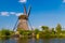 Windmill reflected in canals at Kinderdijk, the Netherlands