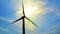 Windmill Silhouette on Cloudy Blue Sky Background