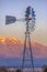 Windmill sits in front of Utah Lake and Timpanogos