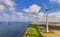 Windmill turbines at sea generate green energy in the Netherlands