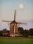 Windmill under a full moon