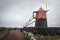 Windmill on a vineyard on the island of Pico entered in the UNESCO World Heritage Site