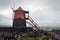 Windmill vineyards with lava wall on the island of Pico entered in the UNESCO World Heritage Site