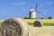 Windmill, wheat field and straw