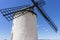 Windmill, White wind mills for grinding wheat. Town of Consuegra in the province of Toledo, Spain