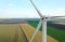 Windmill in wide field. Energy efficiency