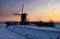 Windmill the Wingerdse Molen under a colorful sky