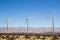 Windmills along a desert landscape