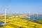 Windmills on autumn paddy field