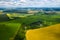 Windmills on the background of forests and fields. Windmill in nature.Belarus