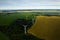 Windmills on the background of forests and fields. Windmill in nature.Belarus