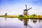 Windmills and canal in Kinderdijk, Holland or Netherlands. Unesco site