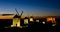 windmills with castle at night, Consuegra, Castile-La Mancha, Sp