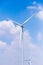 Windmills for electric power production with blue sky