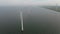 Windmills for electric power production Netherlands Flevoland, Wind turbines farm in sea, windmill farm producing green