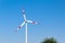 Windmills for electricity generation. Green energy concept. Background with copy space. Huge blades close up