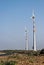 Windmills for electricity generation  near a highway in Gujrat, India.