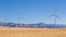 Windmills in front of Granite Peak in Utah