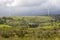 Windmills in green Irish countryside