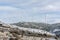 Windmills high on a mountain during winter in the interior of Spain