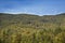 Windmills on a high ridge against a blue sky, Maine.