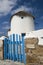 Windmills on the island of Mykonos, Greece. Wide shot with front gate