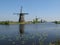 Windmills of kinderdijk, Holland along the water in springtime