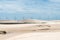 Windmills in LenÃ§Ã³is Maranhenses National Park in Brazil