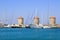 Windmills in mandraki port in Rhodes, Dodecanese