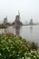 Windmills in a mist