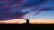 Windmills in the Netherlands. Historic buildings. Agriculture. Summer landscape during sunset. Bright sky and the silhouette of a