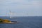 Windmills on an ocean coast