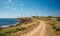 Windmills on Oceanfront Dirt Road