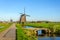 Windmills in a rural Dutch landscape