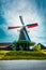 Windmills. Summer at Zaanse Schans. Authentic dutch landscape with old wind mills. Holland, Netherlands