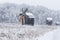 Windmills in Village Museum during snowy winter