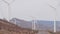 Windmills on wind farm, wind mill energy generators. Desert windfarm, USA.