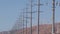 Windmills on wind farm, wind mill energy generators. Desert windfarm, USA.