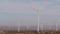 Windmills on wind farm, wind mill energy generators. Desert windfarm, USA.