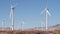 Windmills on wind farm, wind mill energy generators. Desert windfarm, USA.