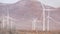 Windmills on wind farm, wind mill energy generators. Desert windfarm, USA.