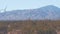 Windmills on wind farm, wind mill energy generators. Desert windfarm, USA.