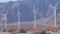 Windmills on wind farm, wind mill energy generators. Desert windfarm, USA.