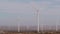 Windmills on wind farm, wind mill energy generators. Desert windfarm, USA.